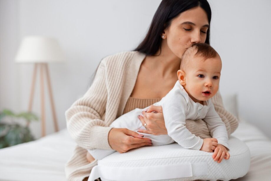 front-view-mother-holding-newborn-baby